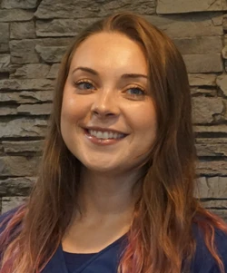 A headshot photo of Kyra, a chiropractic assistant at the clinic